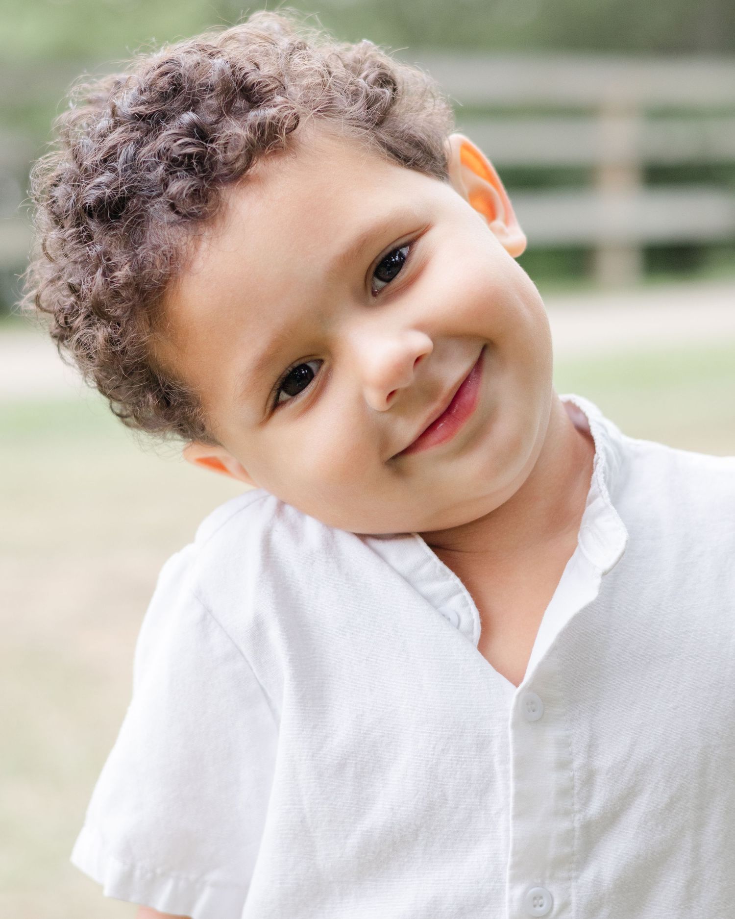 smiling young boy outdoor child portrait natural light family photography St Albert Alberta