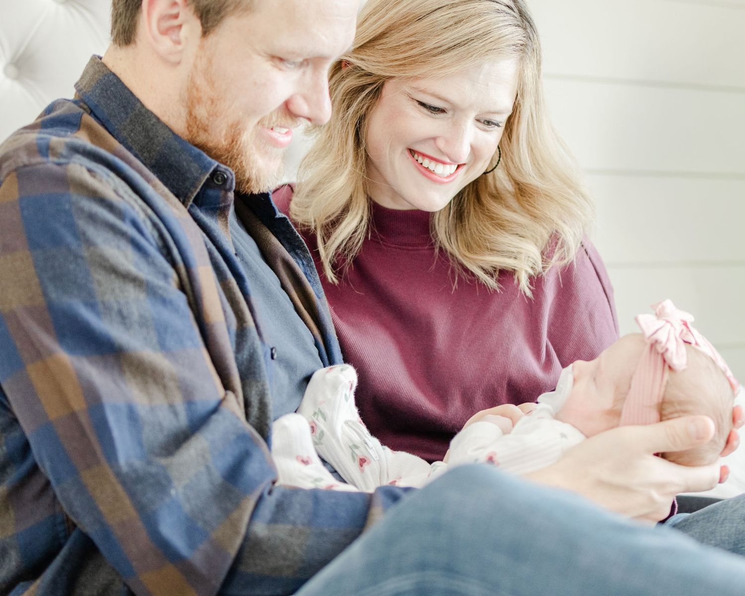 new parents holding newborn baby lifestyle family photography St Albert Alberta
