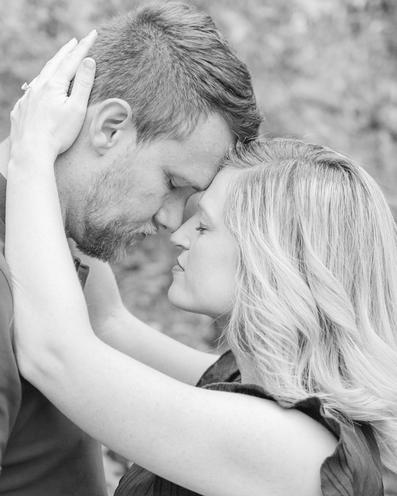 romantic couple portrait touching foreheads black and white engagement photography St Albert