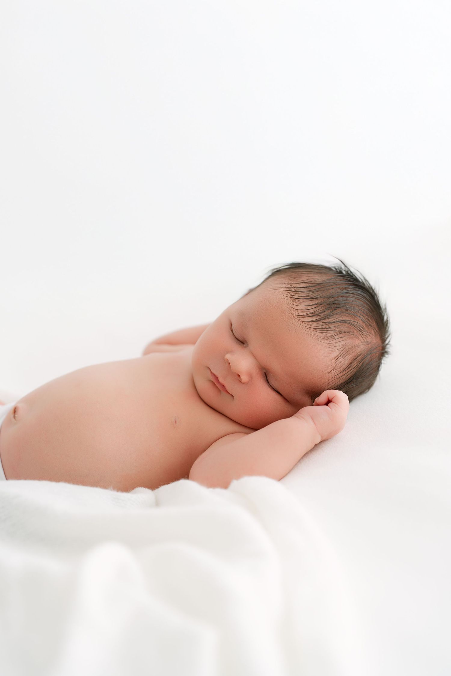 newborn photography near Nashville TN in a bright studio environment