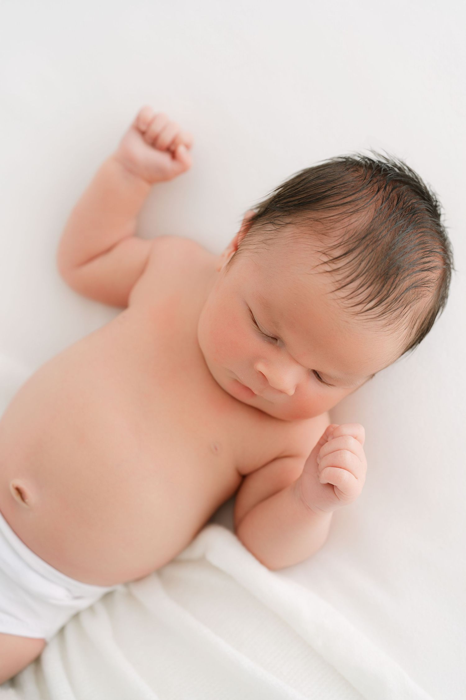 studio newborn photography in Clarksville TN with light-filled aesthetic