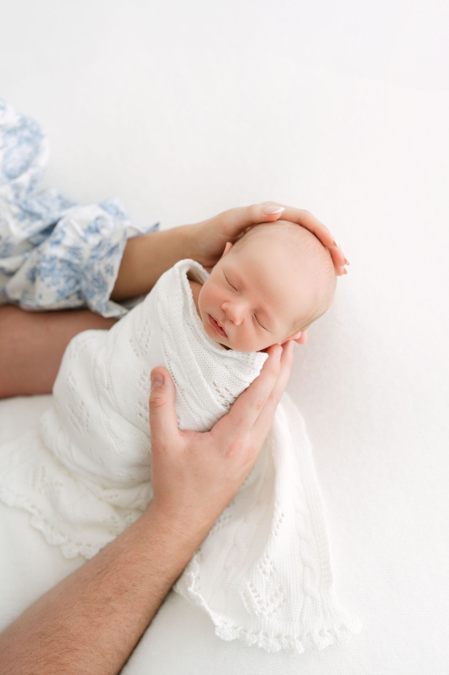 baby-led newborn session in Clarksville TN with soft white tones