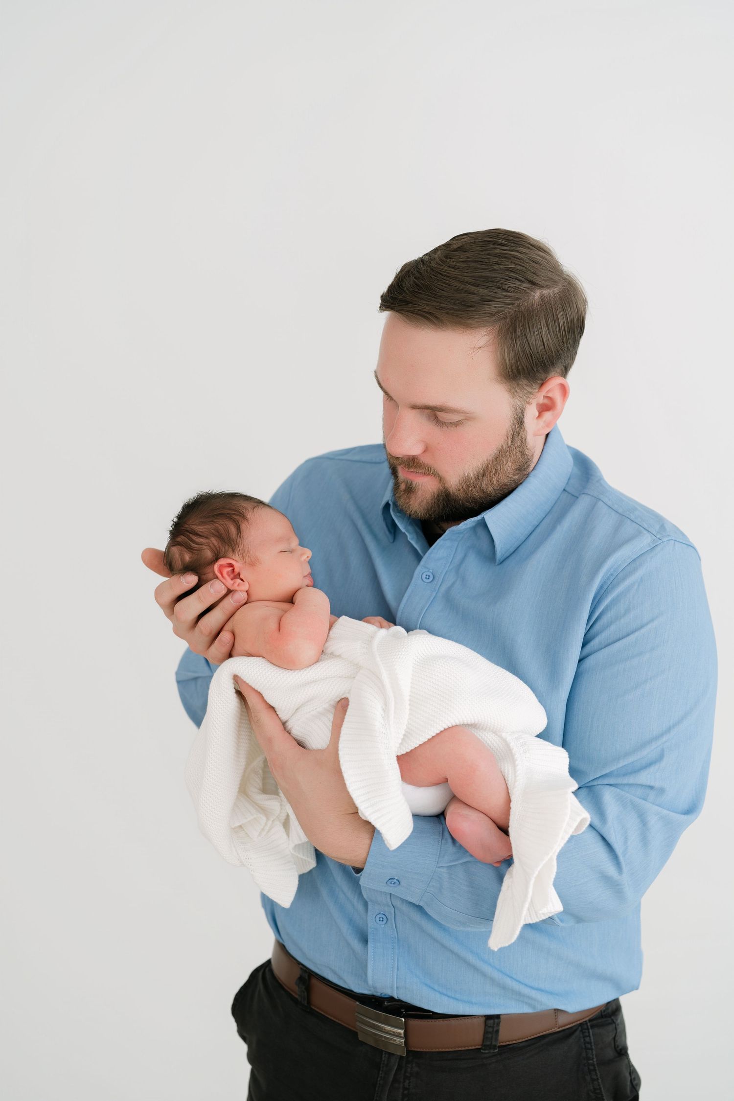 organic family moments captured during newborn photography session