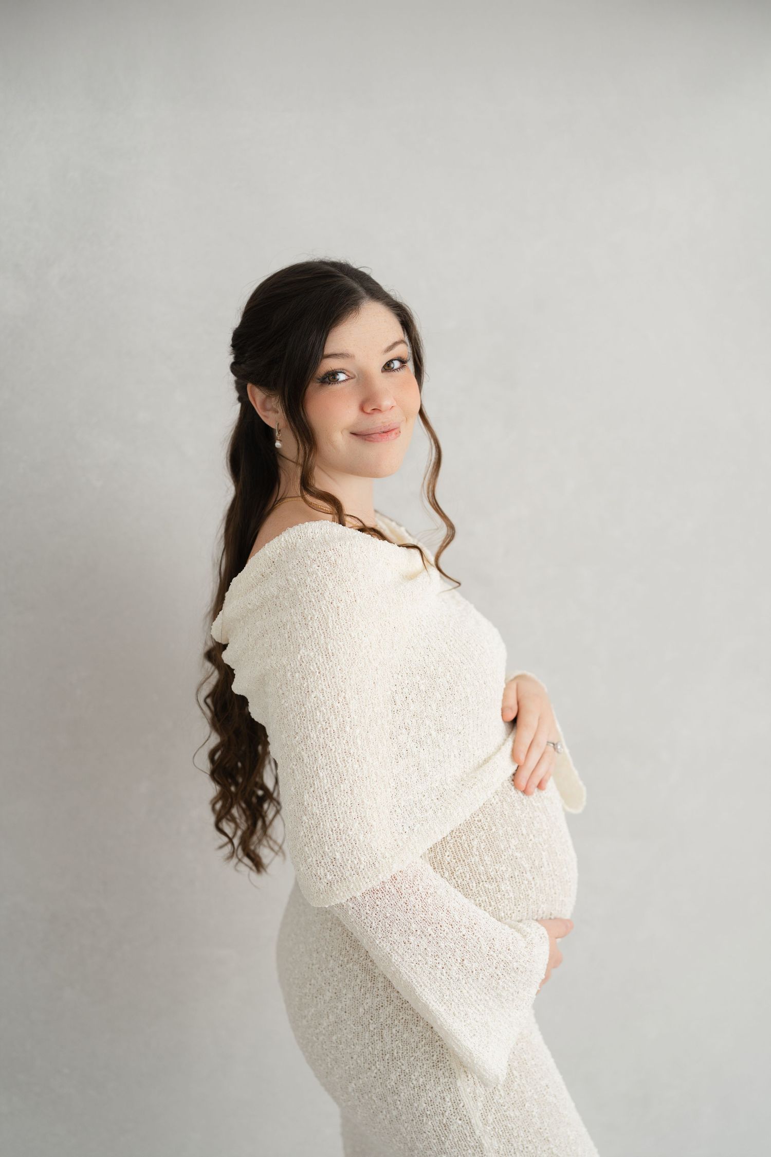 expecting mom in light-filled Clarksville TN photography studio