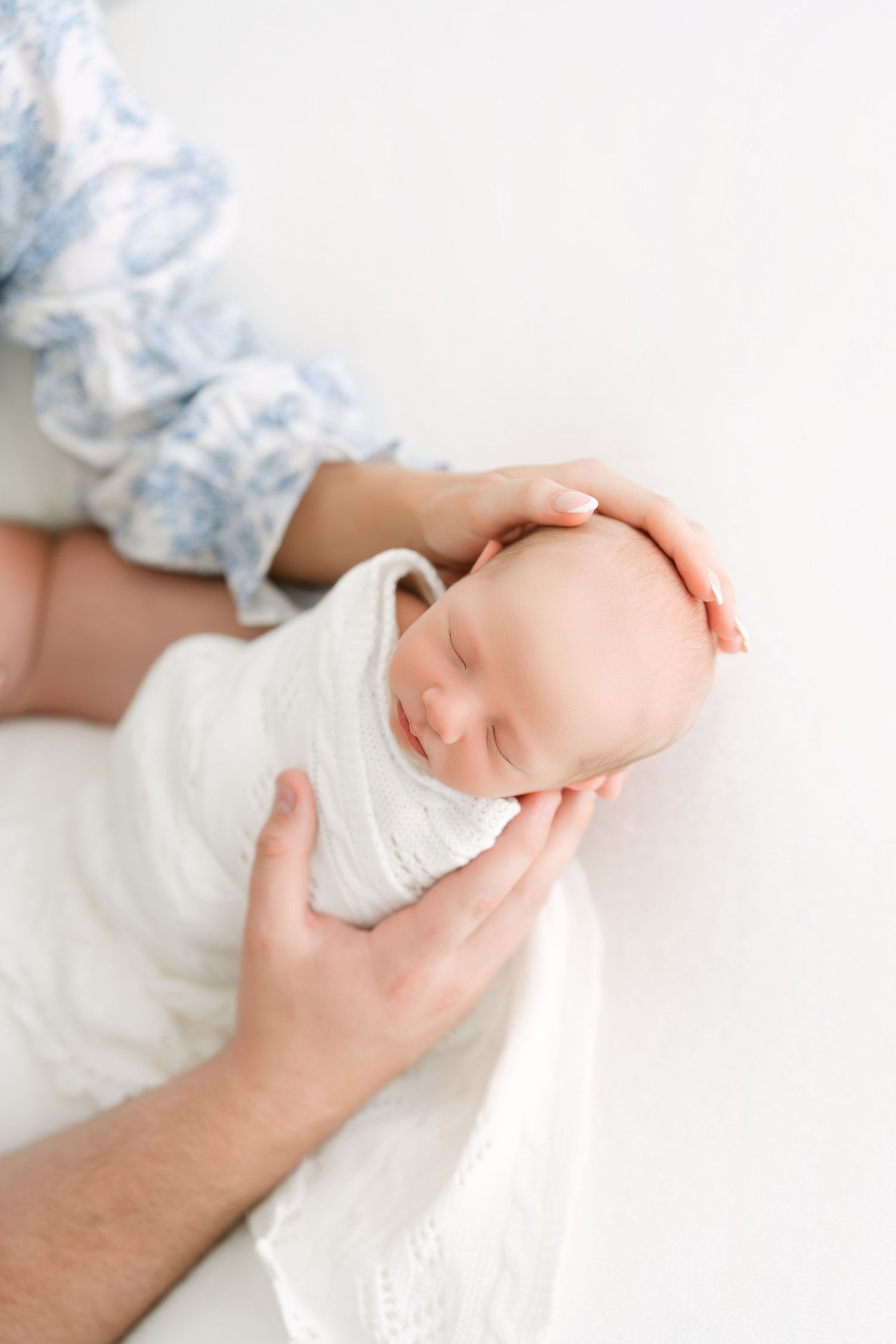 baby-led newborn session in Clarksville TN with soft white tones