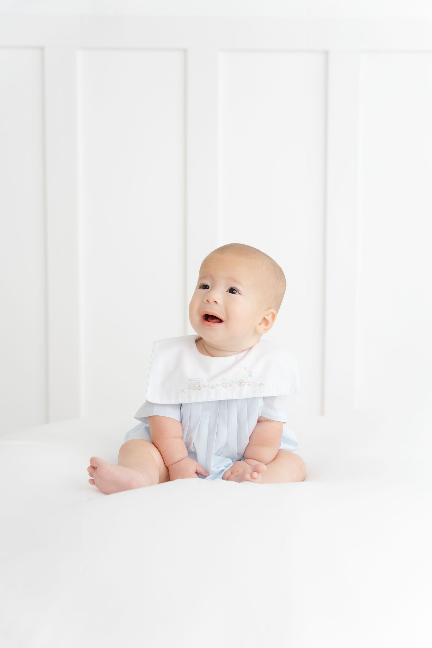 soft, minimal baby milestone session in Clarksville TN