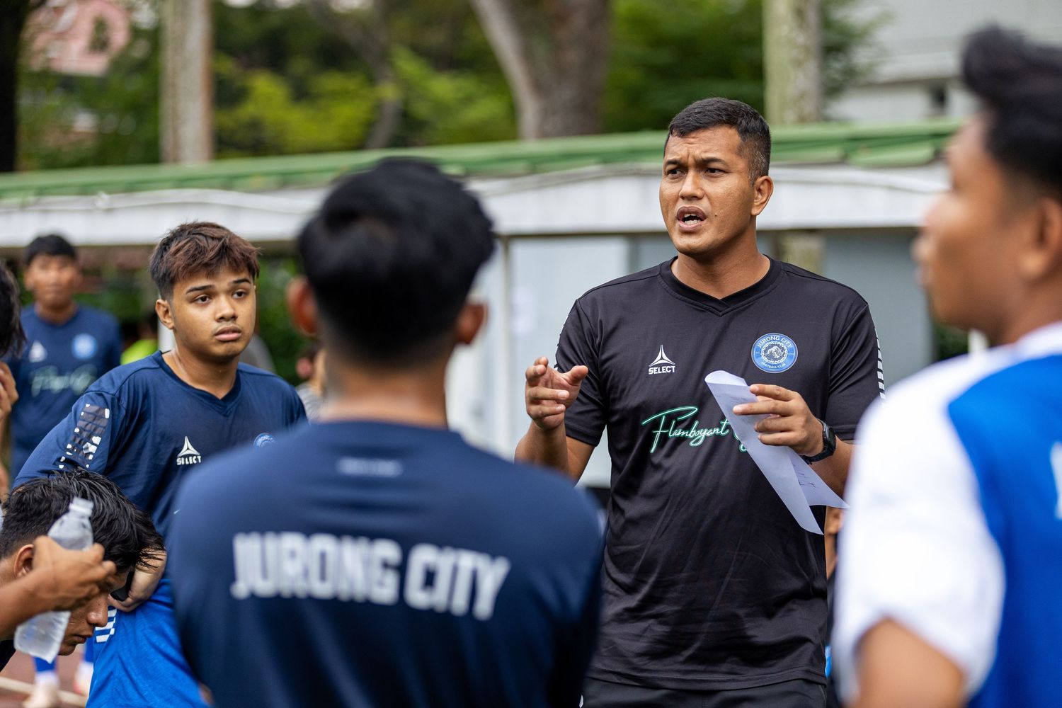 Jurong City FC President Fahmy Noor giving a pep talk before the game.
