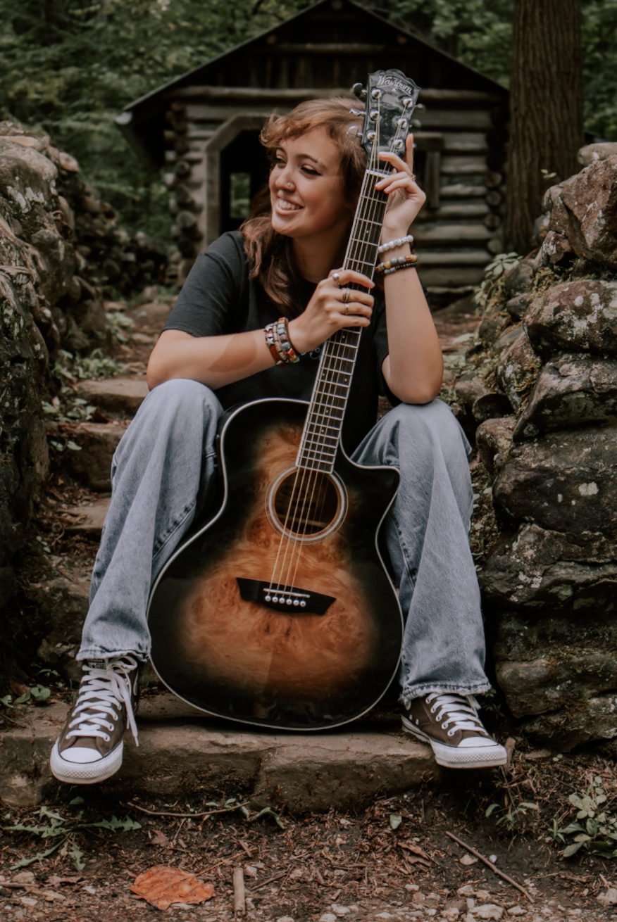 A series of artistic photos featuring an acoustic guitar being held casually while sitting on rocky terrain in a moody setting.