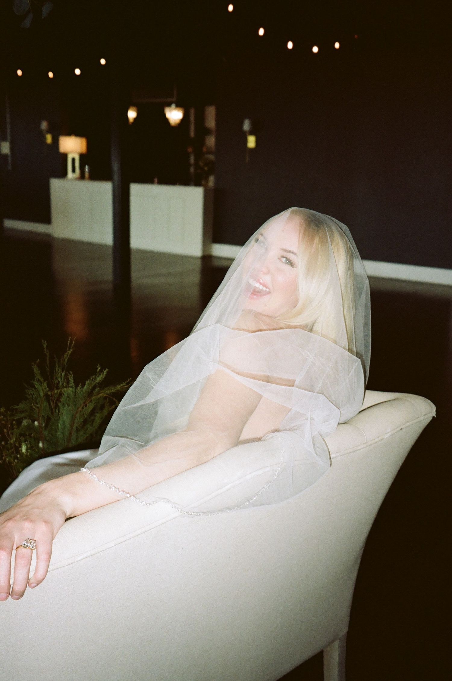 Bridal portraits on 35mm film while getting ready in Chicago, Chicago wedding with Natalie H Collective Wedding photographer