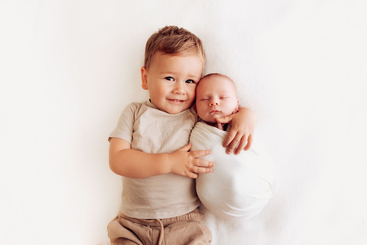 Perth newborn photography studio session with older siblings
