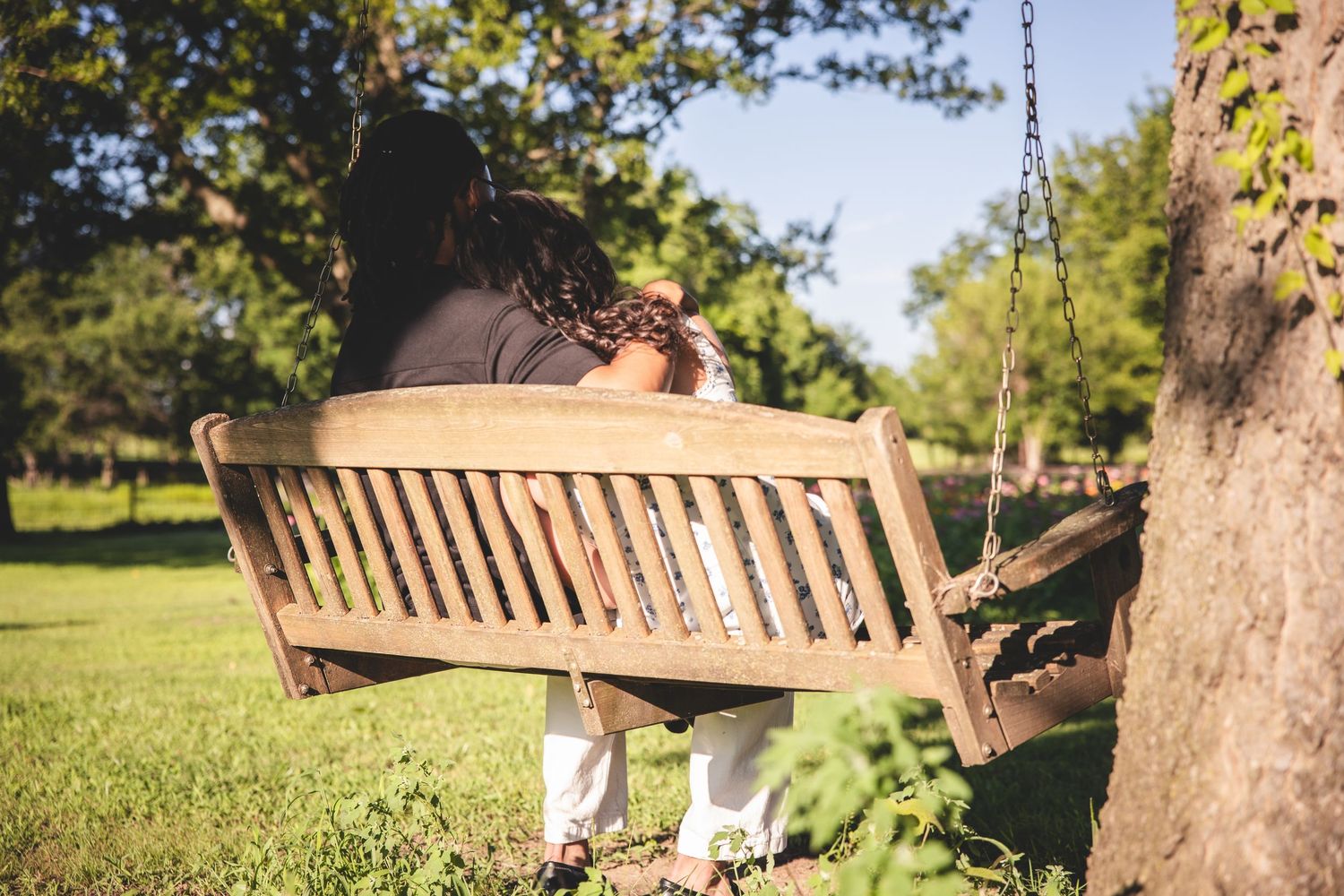 couple swinging on a porch swing