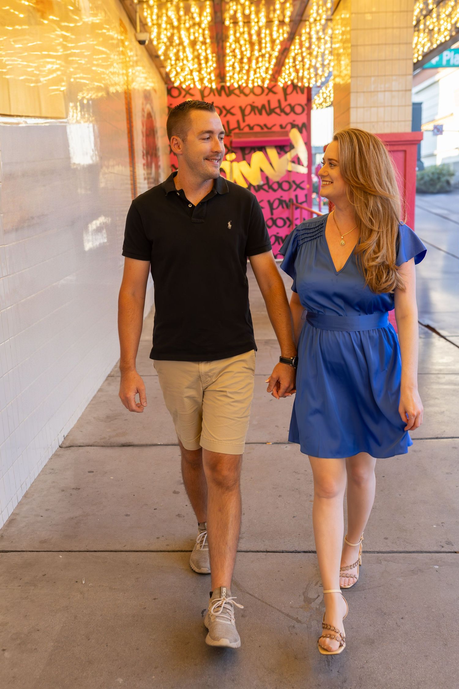 Couples eloping under neon lights on Fremont Street-Las Vegas photographer