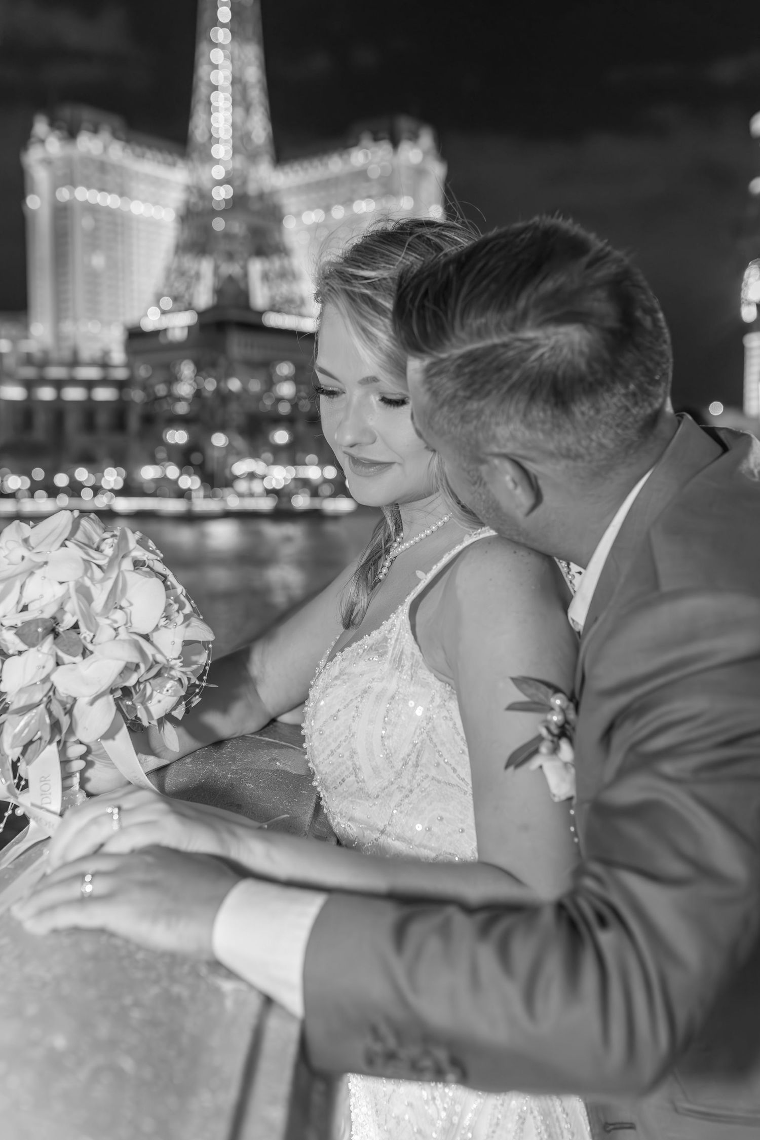 Bride and groom celebrating their elopement at the Las Vegas Bellagio Fountains-Las Vegas photographer