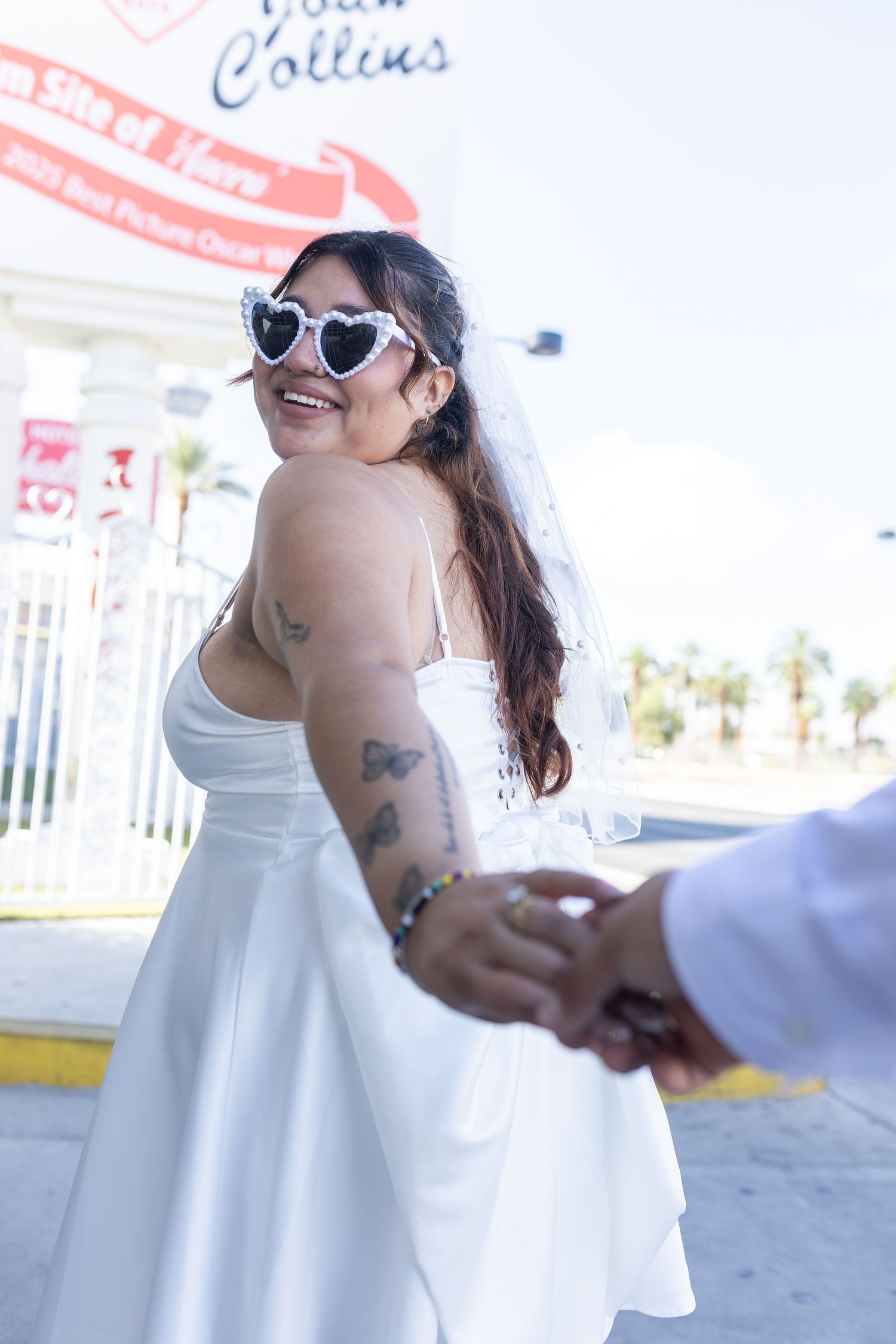 Bride and groom exchanging vows at the Little White chapel in downtown Las Vegas- intimate wedding and elopement photographer
