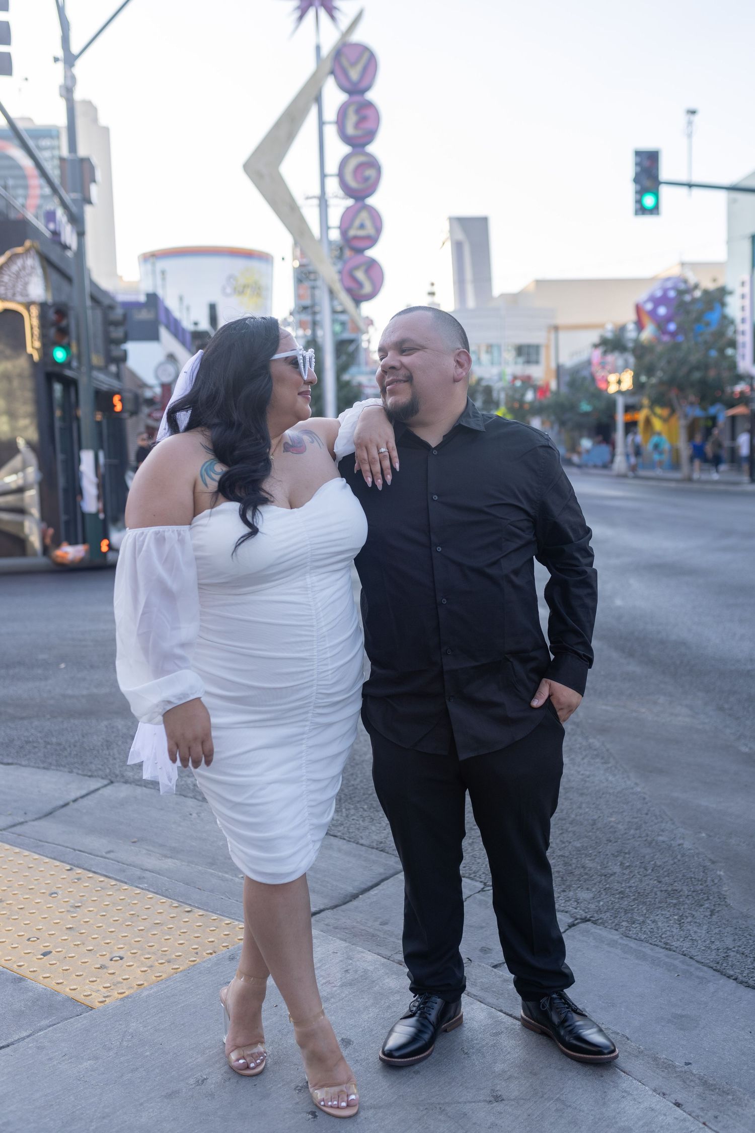 Couples eloping under neon lights on Fremont Street-Las Vegas photographer