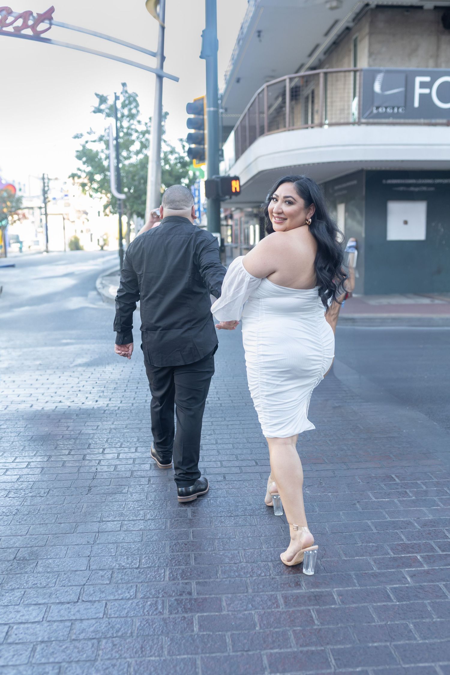Couples eloping under neon lights on Fremont Street-Las Vegas photographer