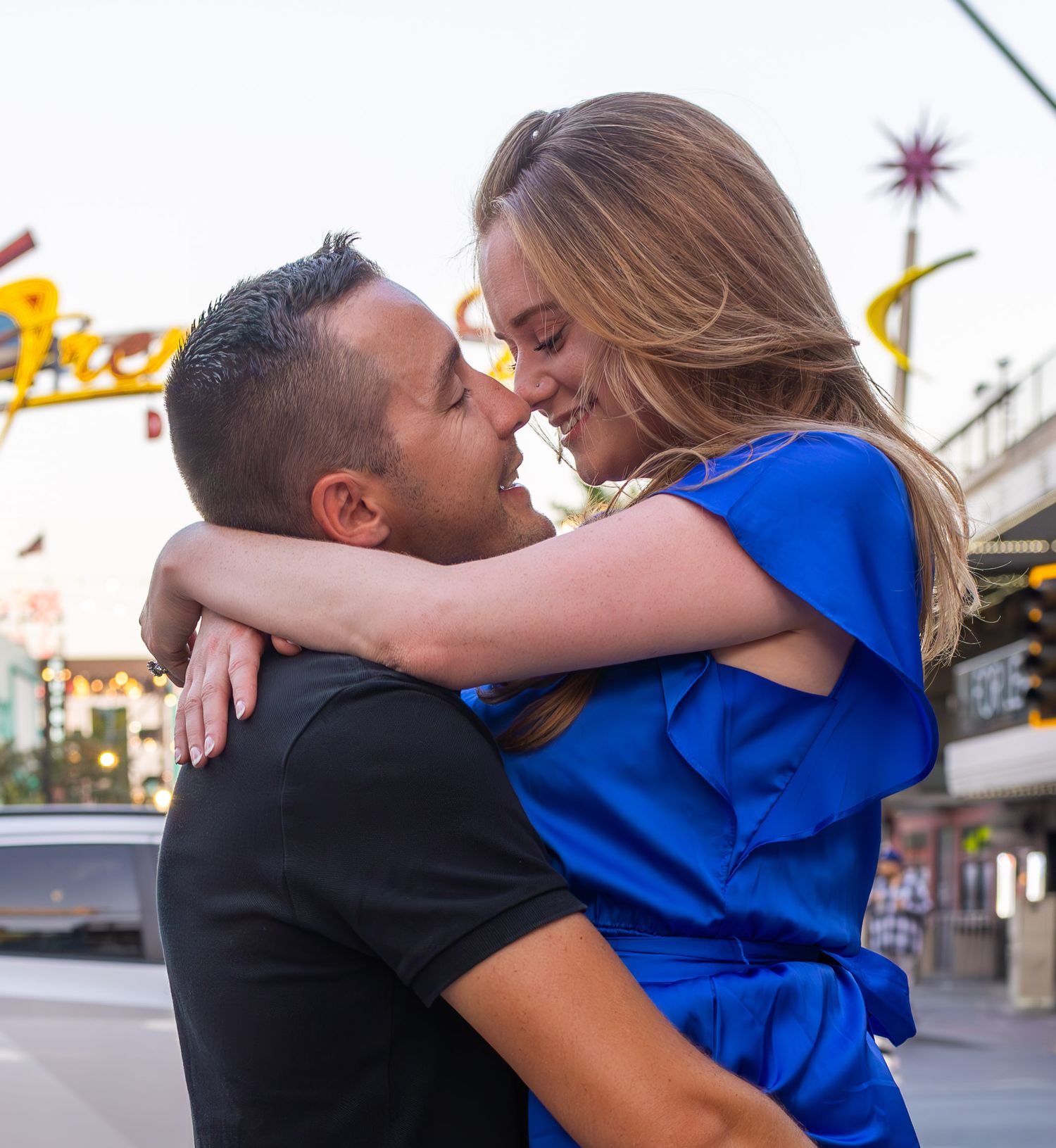 Couples eloping under neon lights on Fremont Street-Las Vegas photographer