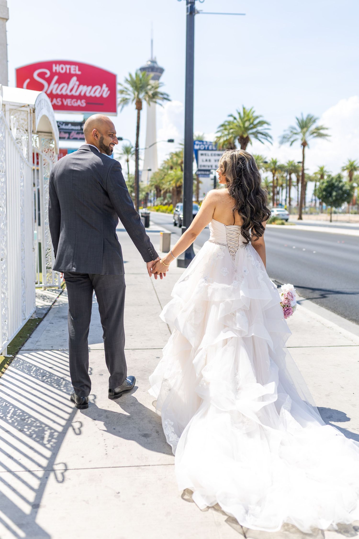 Bride and groom exchanging vows at the Little White chapel in downtown Las Vegas- intimate wedding and elopement photographer