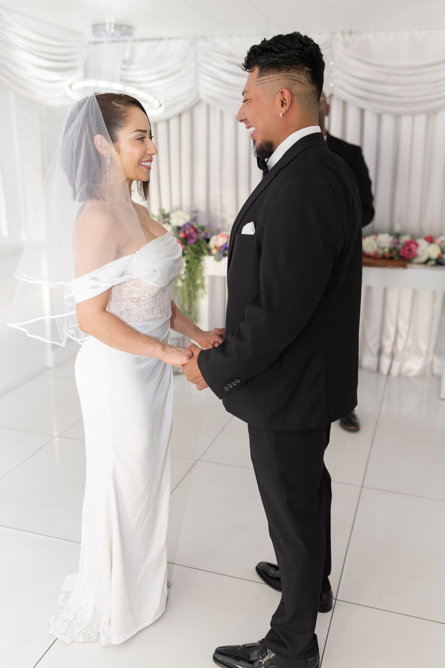 Bride and groom exchanging vows at the Little White chapel in downtown Las Vegas- intimate wedding and elopement photographer