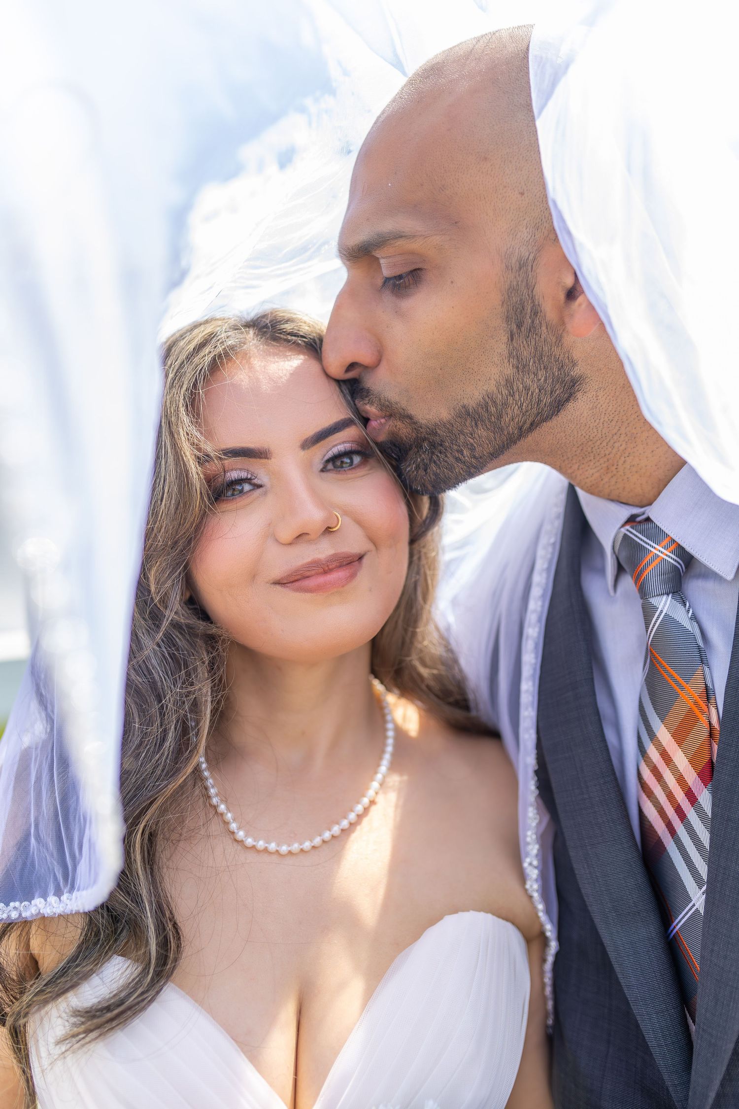 Bride and groom exchanging vows at the Little White chapel in downtown Las Vegas- intimate wedding and elopement photographer