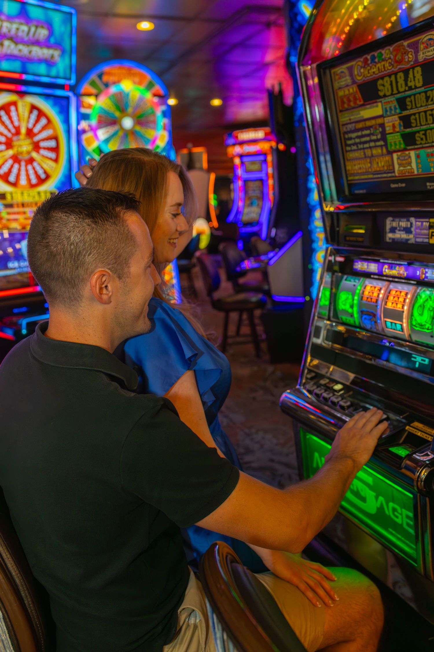 Couples eloping under neon lights on Fremont Street-Las Vegas photographer