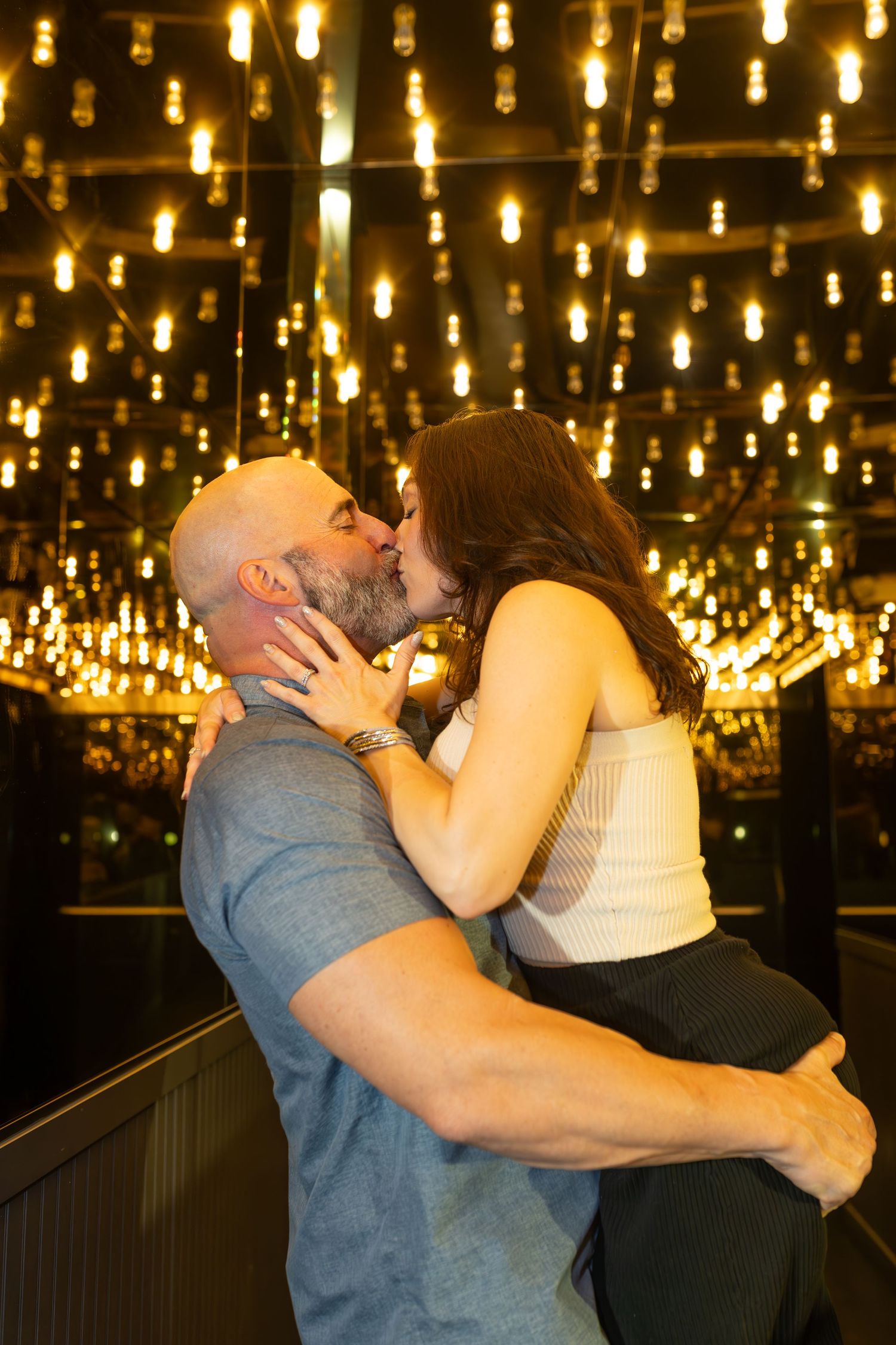 Couples eloping under neon lights on Fremont Street-Las Vegas photographer