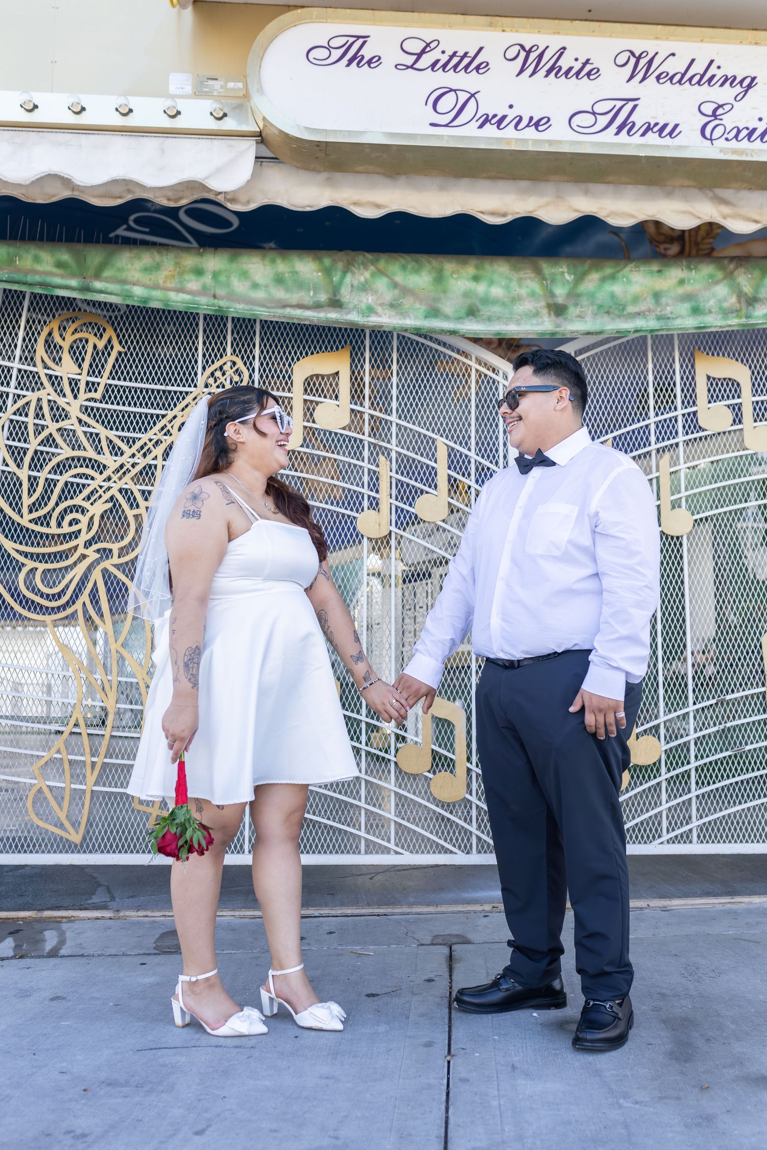 Bride and groom exchanging vows at the Little White chapel in downtown Las Vegas- intimate wedding and elopement photographer