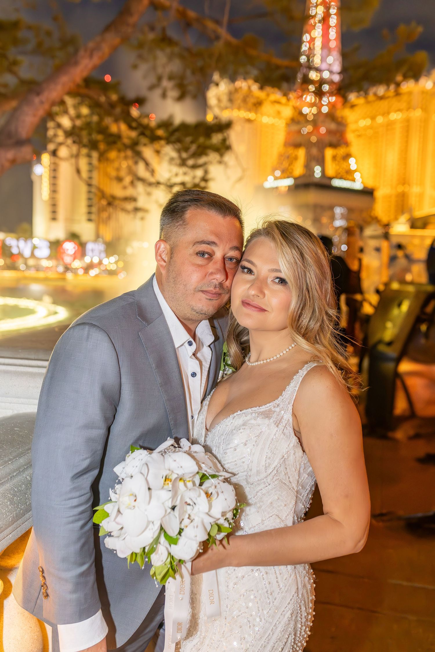 Bride and groom celebrating their elopement at the Las Vegas Bellagio Fountains-Las Vegas photographer