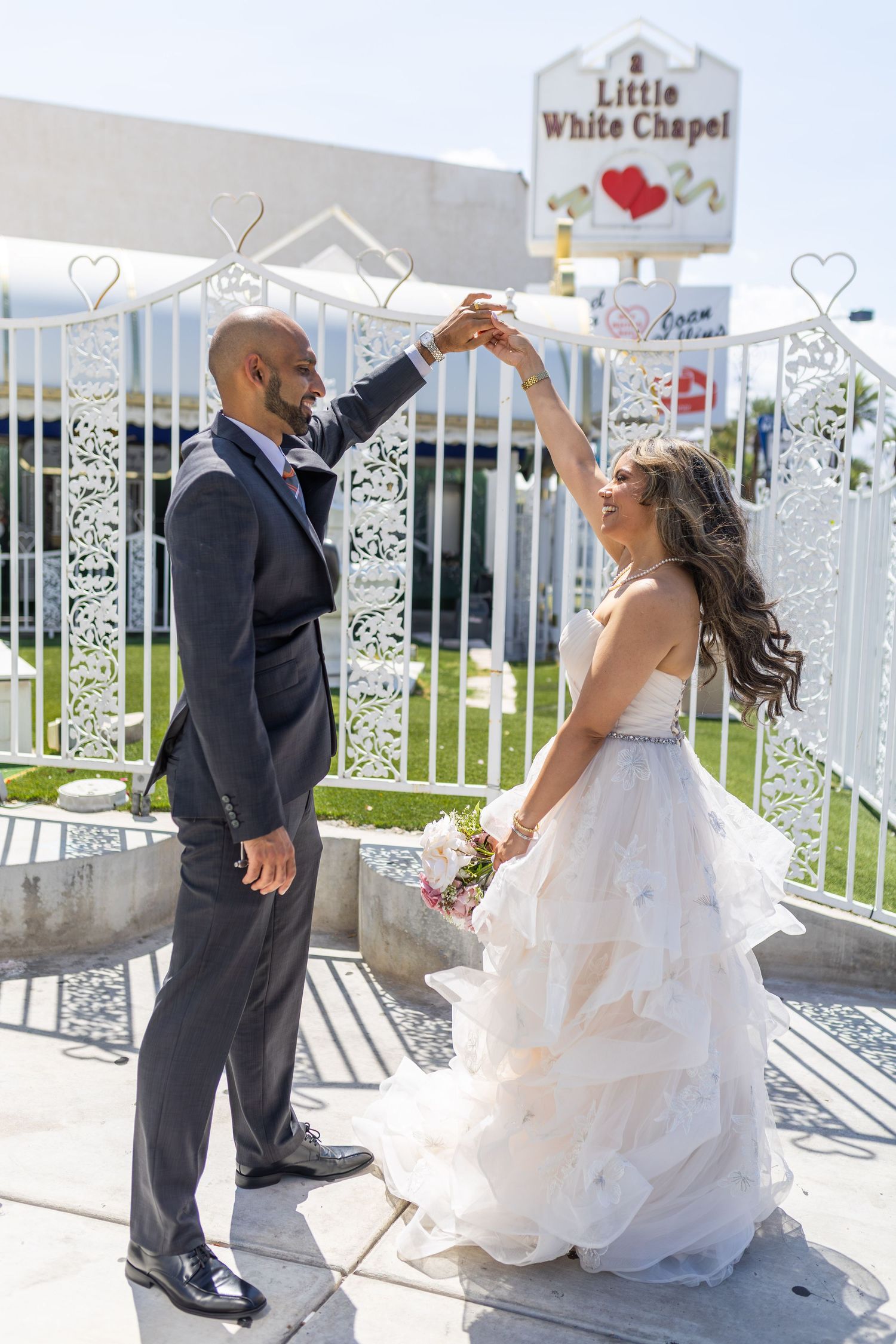 Bride and groom exchanging vows at the Little White chapel in downtown Las Vegas- intimate wedding and elopement photographer