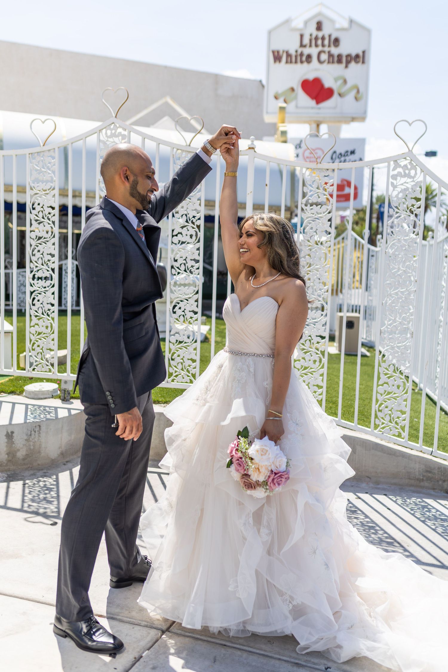 Bride and groom exchanging vows at the Little White chapel in downtown Las Vegas- intimate wedding and elopement photographer