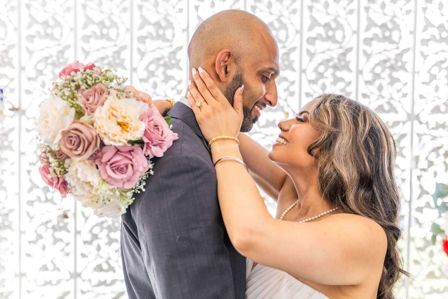 Bride and groom exchanging vows at the Little White chapel in downtown Las Vegas- intimate wedding and elopement photographer
