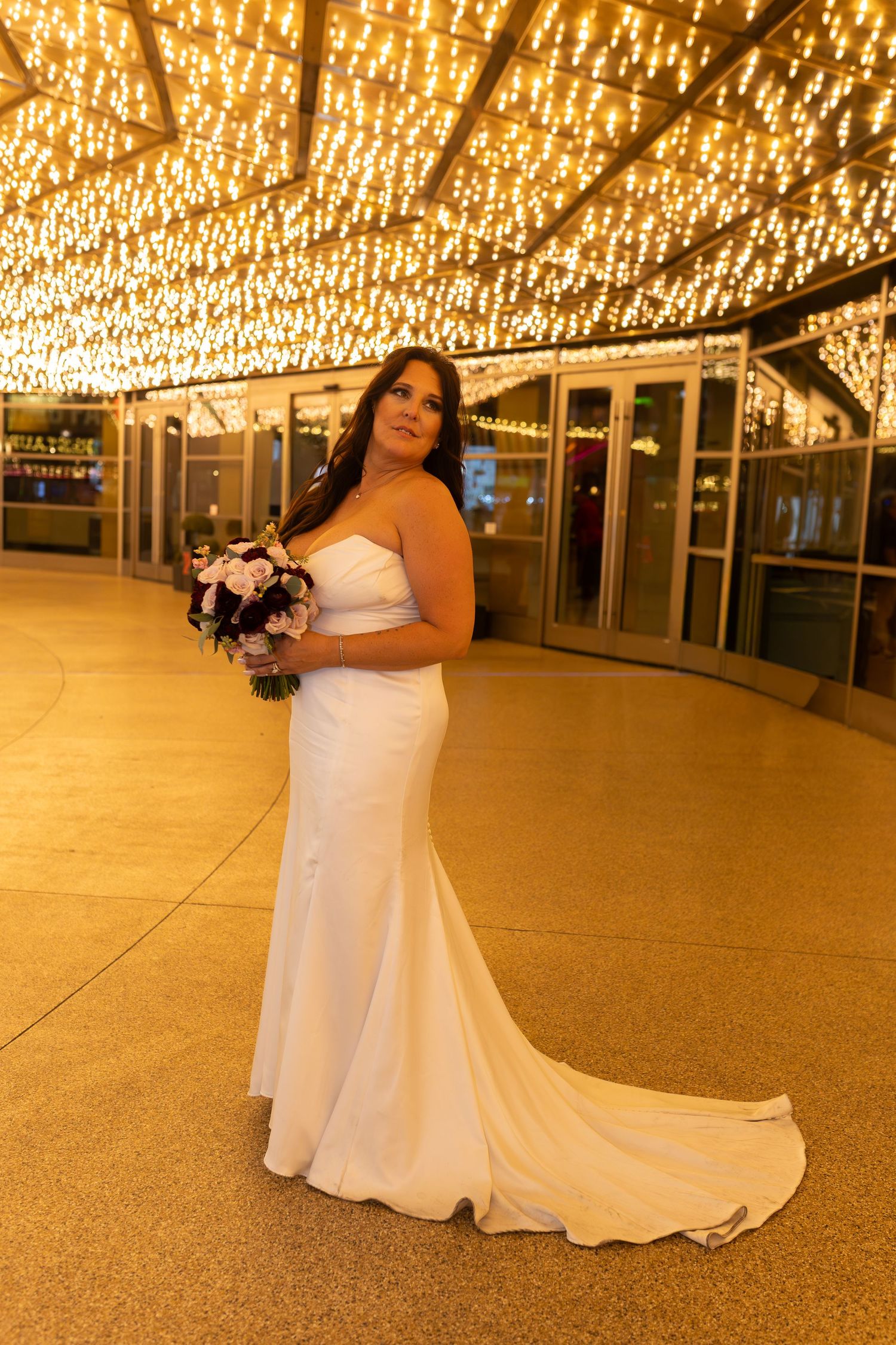 Couples eloping under neon lights on Fremont Street-Las Vegas photographer