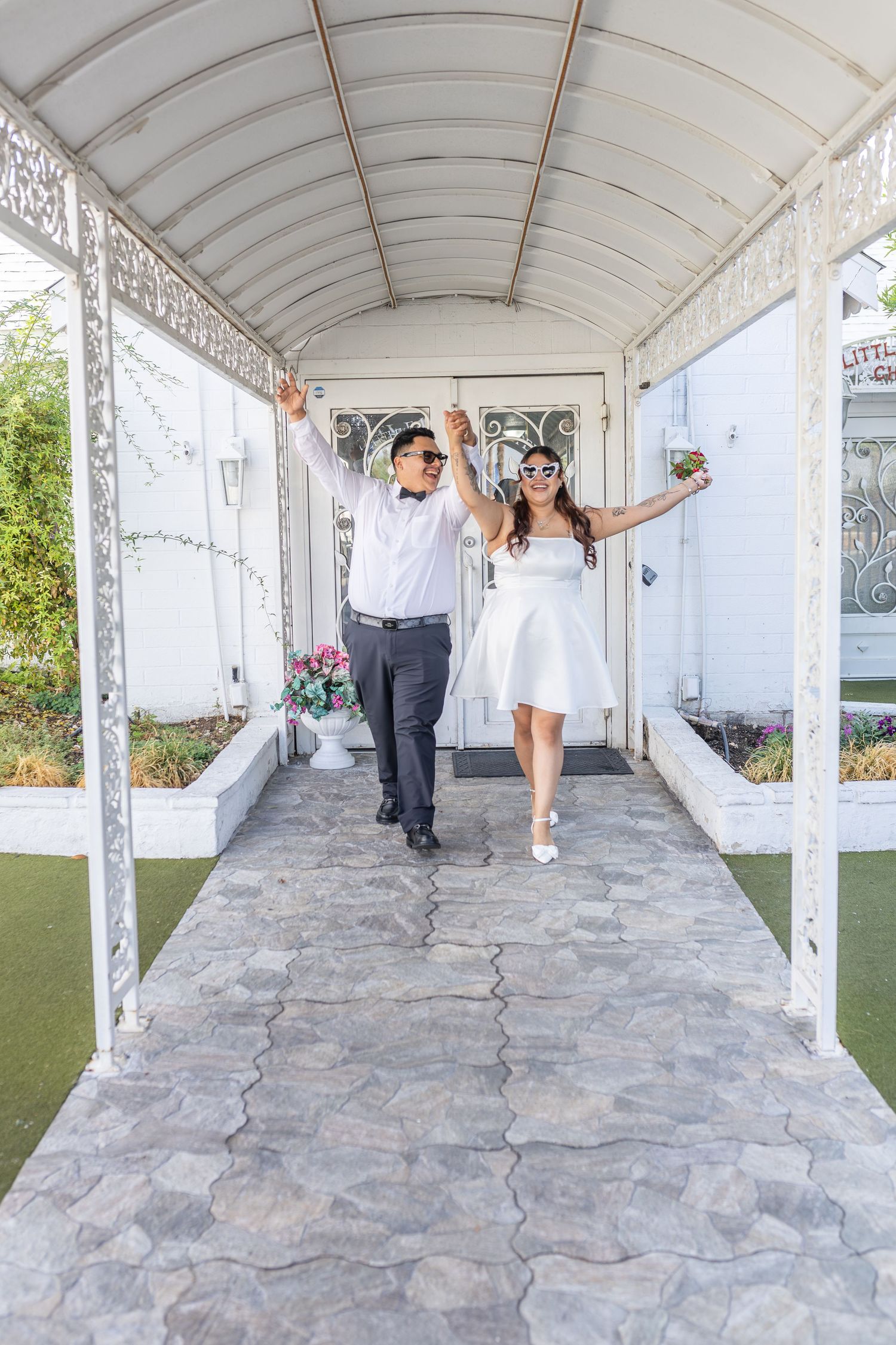 Bride and groom exchanging vows at the Little White chapel in downtown Las Vegas- intimate wedding and elopement photographer