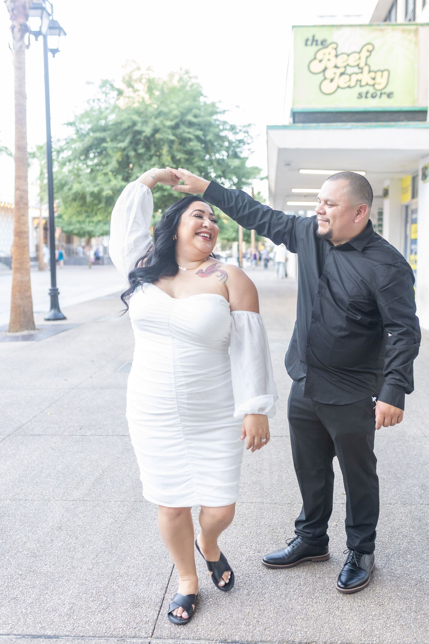 Couples eloping under neon lights on Fremont Street-Las Vegas photographer