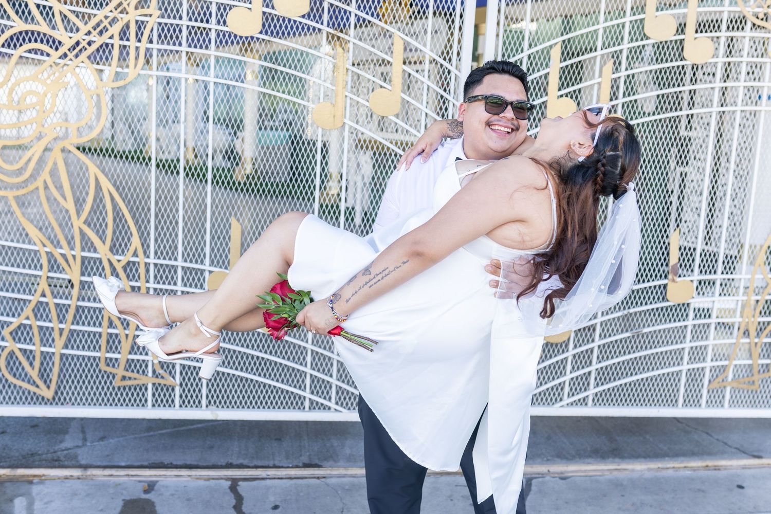 Bride and groom exchanging vows at the Little White chapel in downtown Las Vegas- intimate wedding and elopement photographer