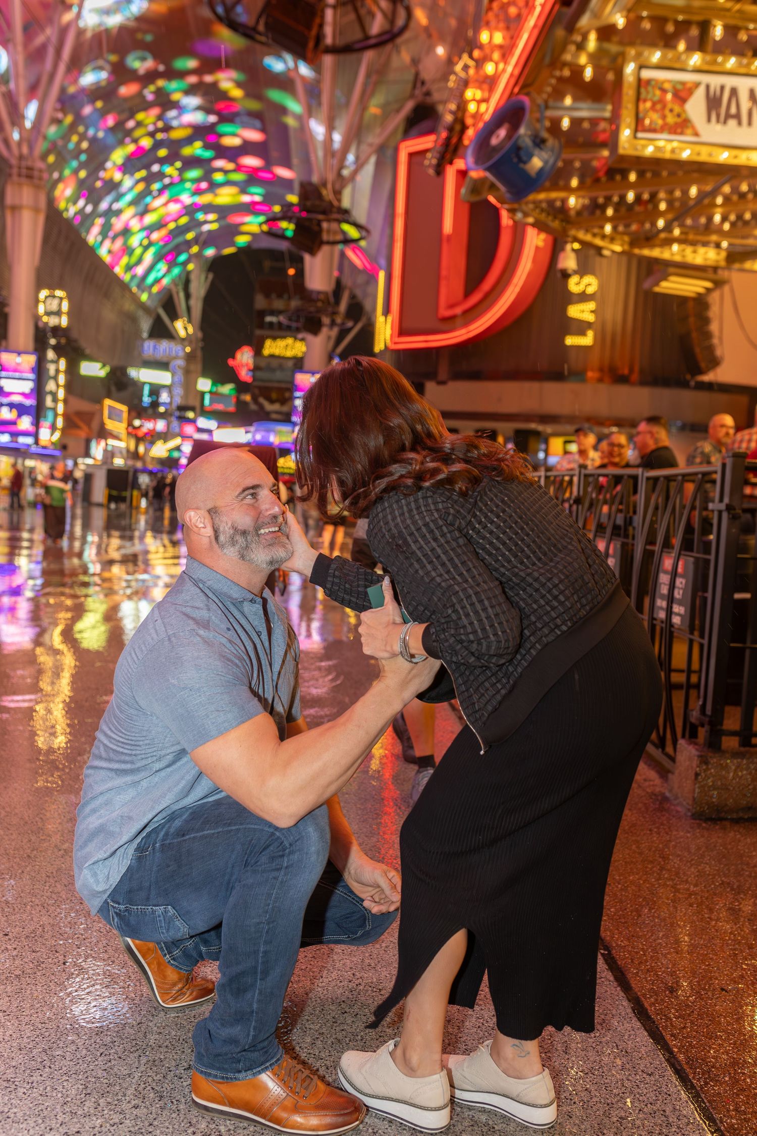 Couples eloping under neon lights on Fremont Street-Las Vegas photographer