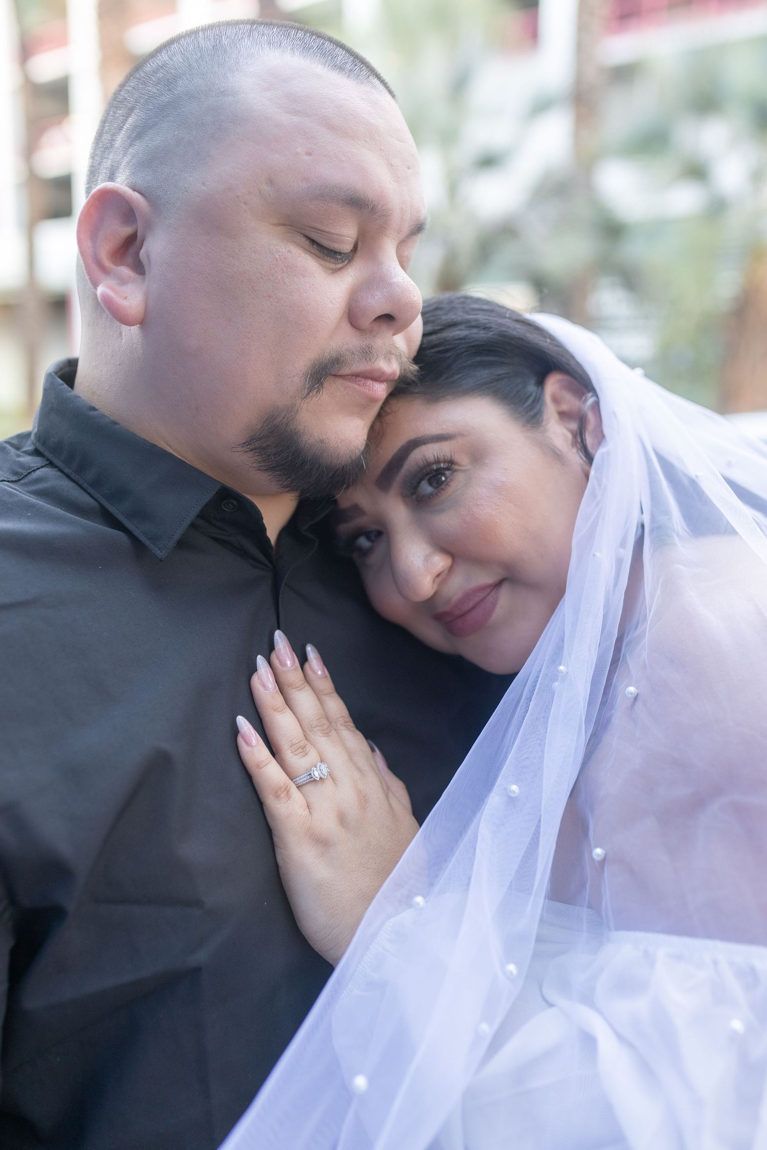 Couples eloping under neon lights on Fremont Street-Las Vegas photographer