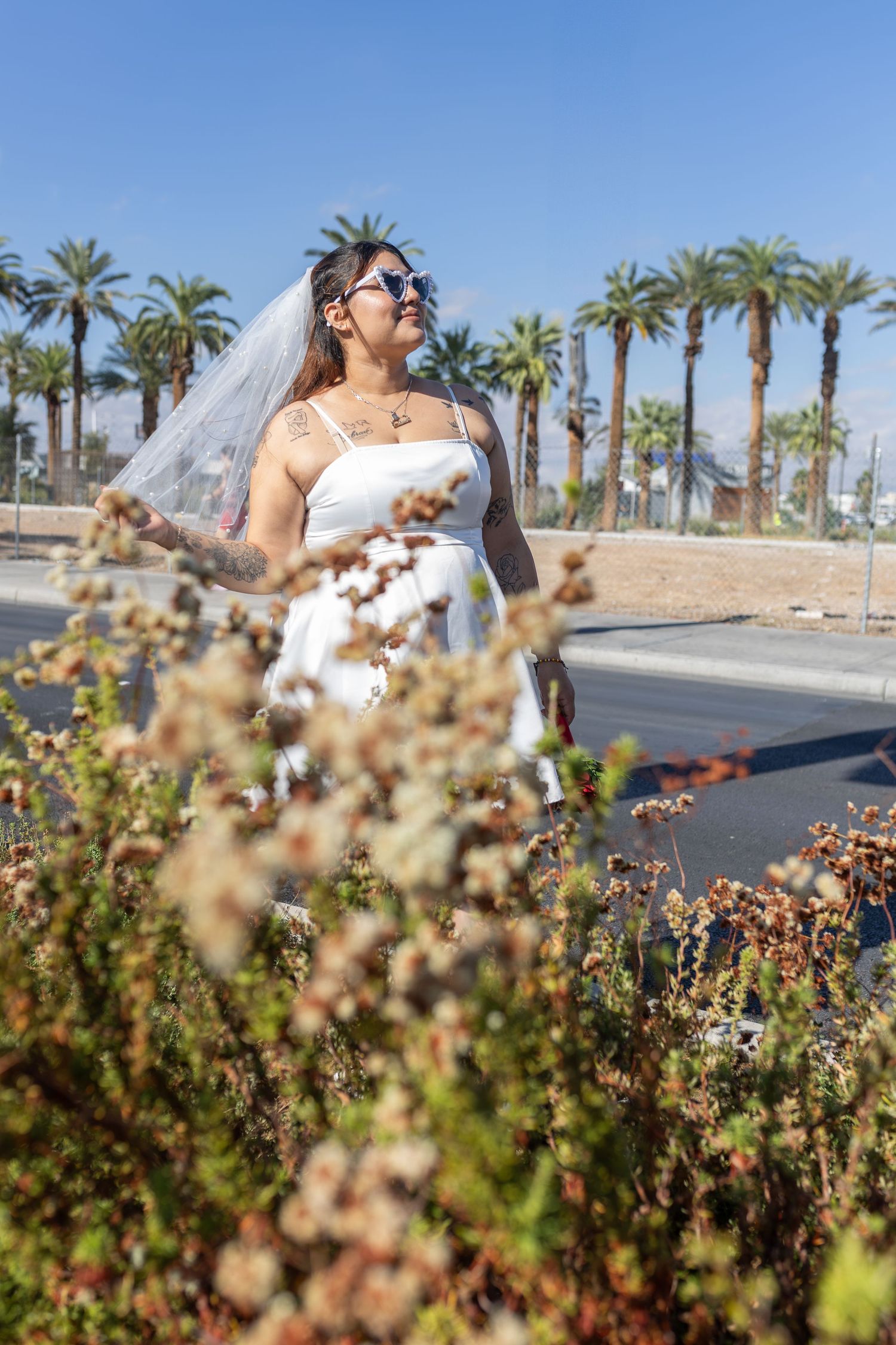 Bride and groom exchanging vows at the Little White chapel in downtown Las Vegas- intimate wedding and elopement photographer