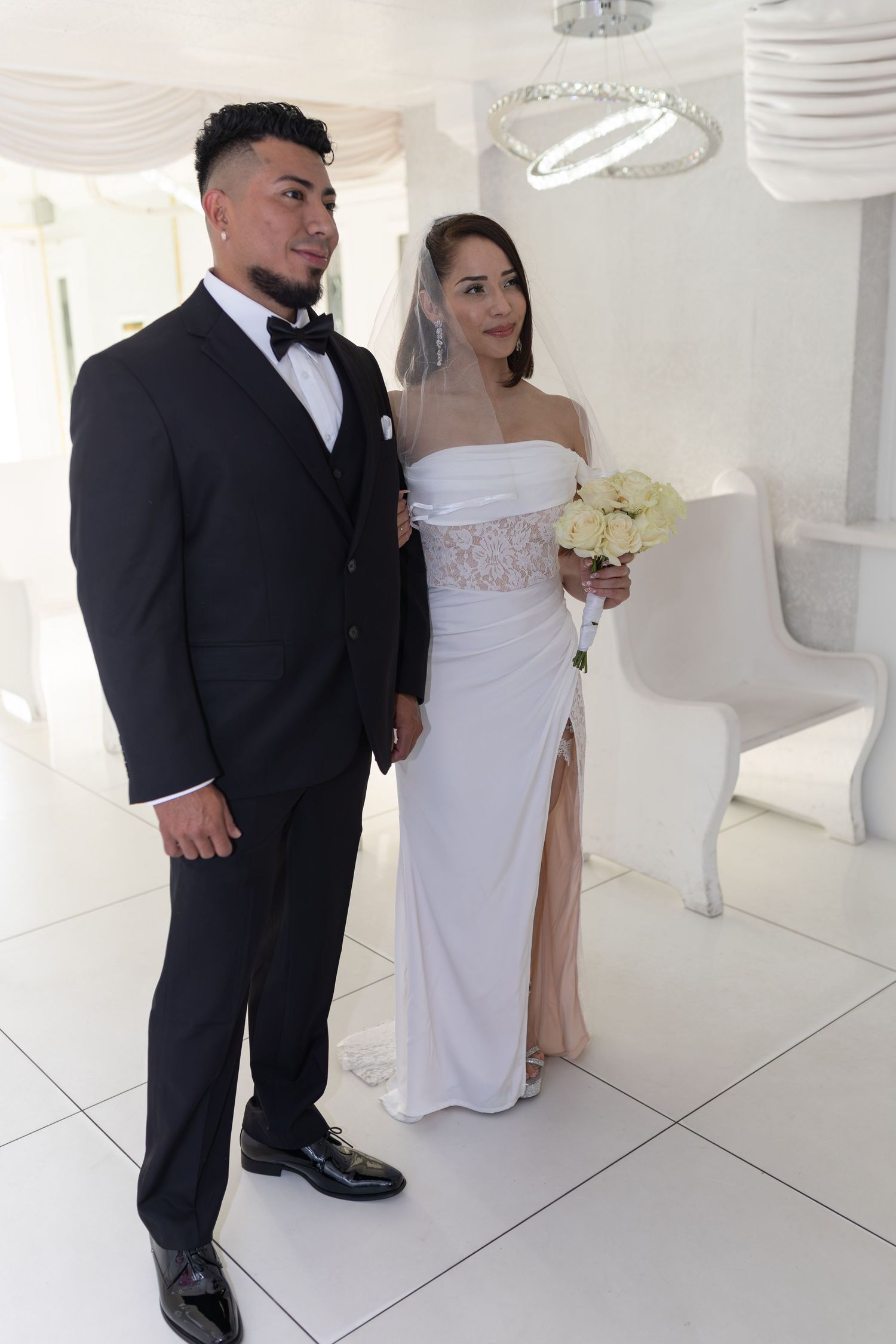 Bride and groom exchanging vows at the Little White chapel in downtown Las Vegas- intimate wedding and elopement photographer