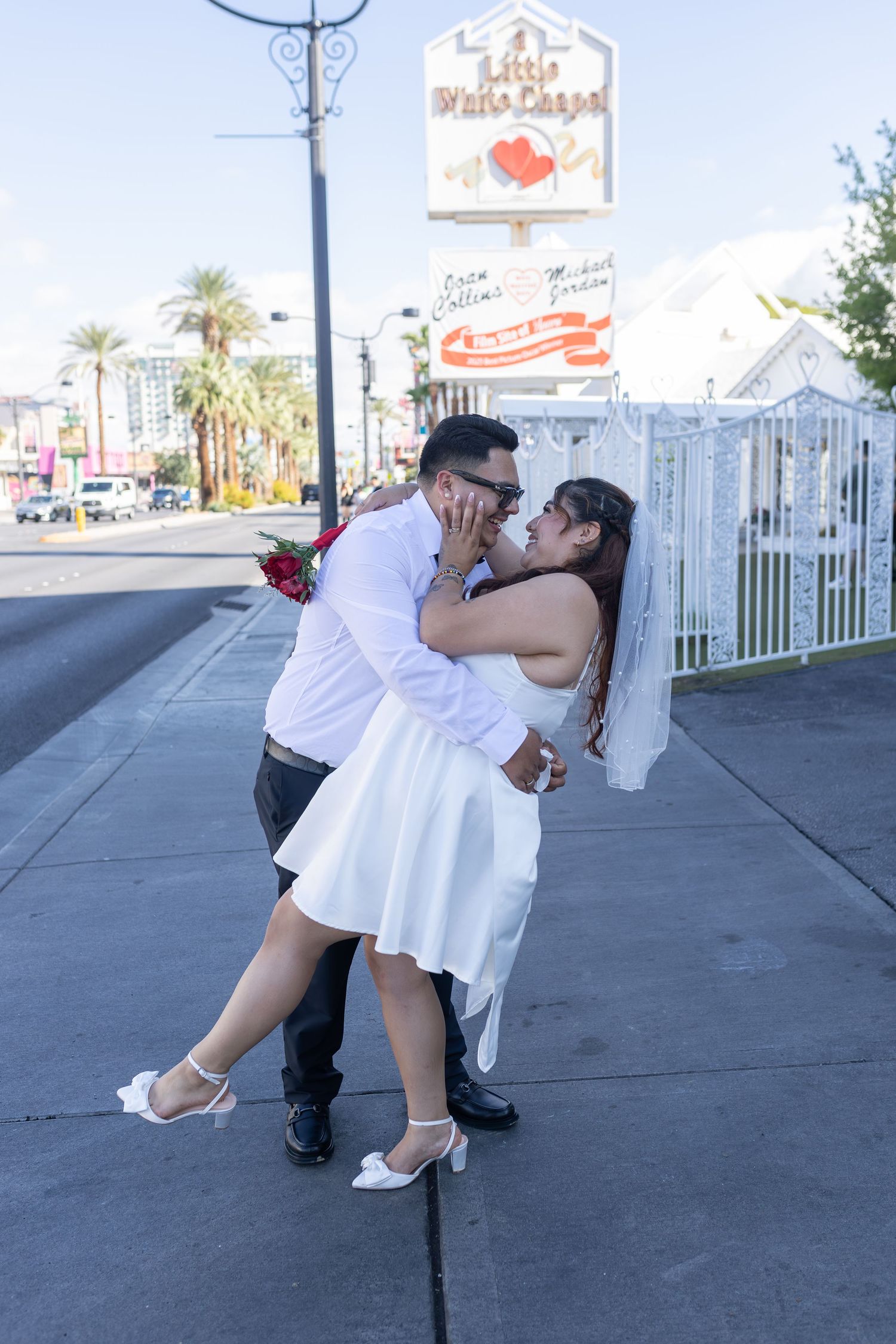 Bride and groom exchanging vows at the Little White chapel in downtown Las Vegas- intimate wedding and elopement photographer