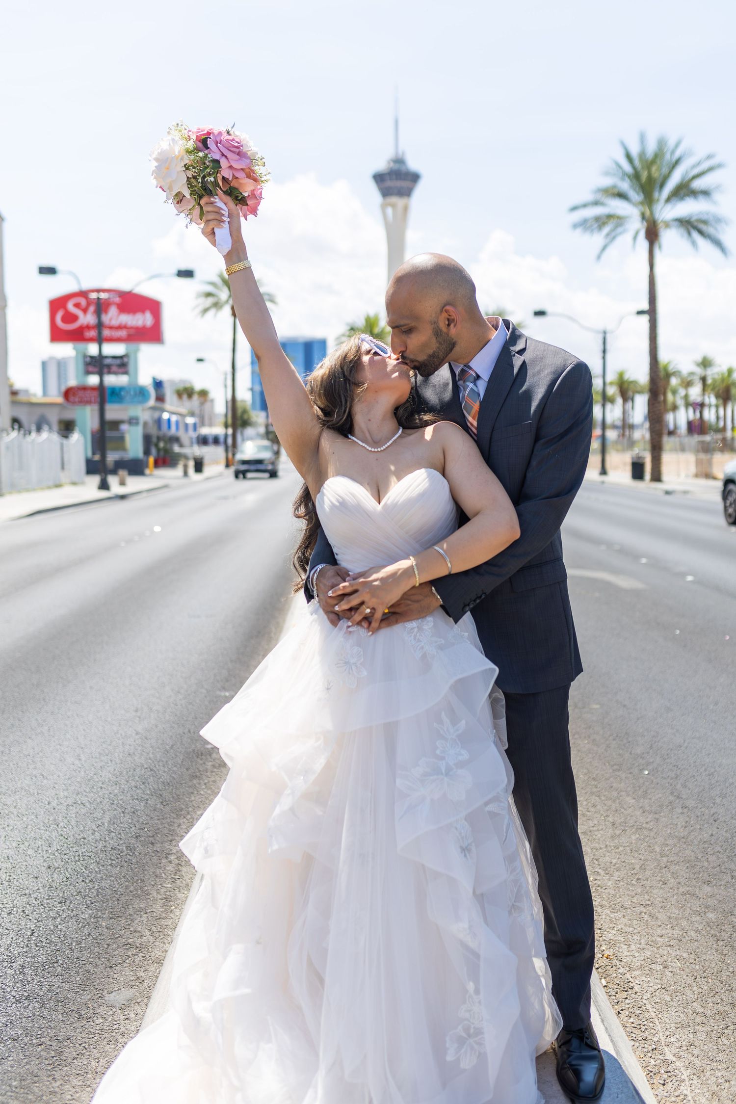 Bride and groom exchanging vows at the Little White chapel in downtown Las Vegas- intimate wedding and elopement photographer
