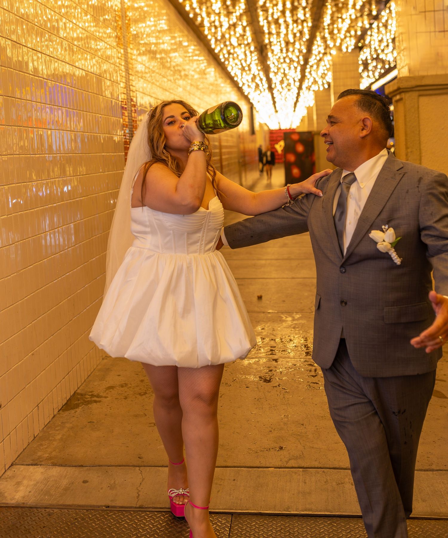 Couples eloping under neon lights on Fremont Street-Las Vegas photographer