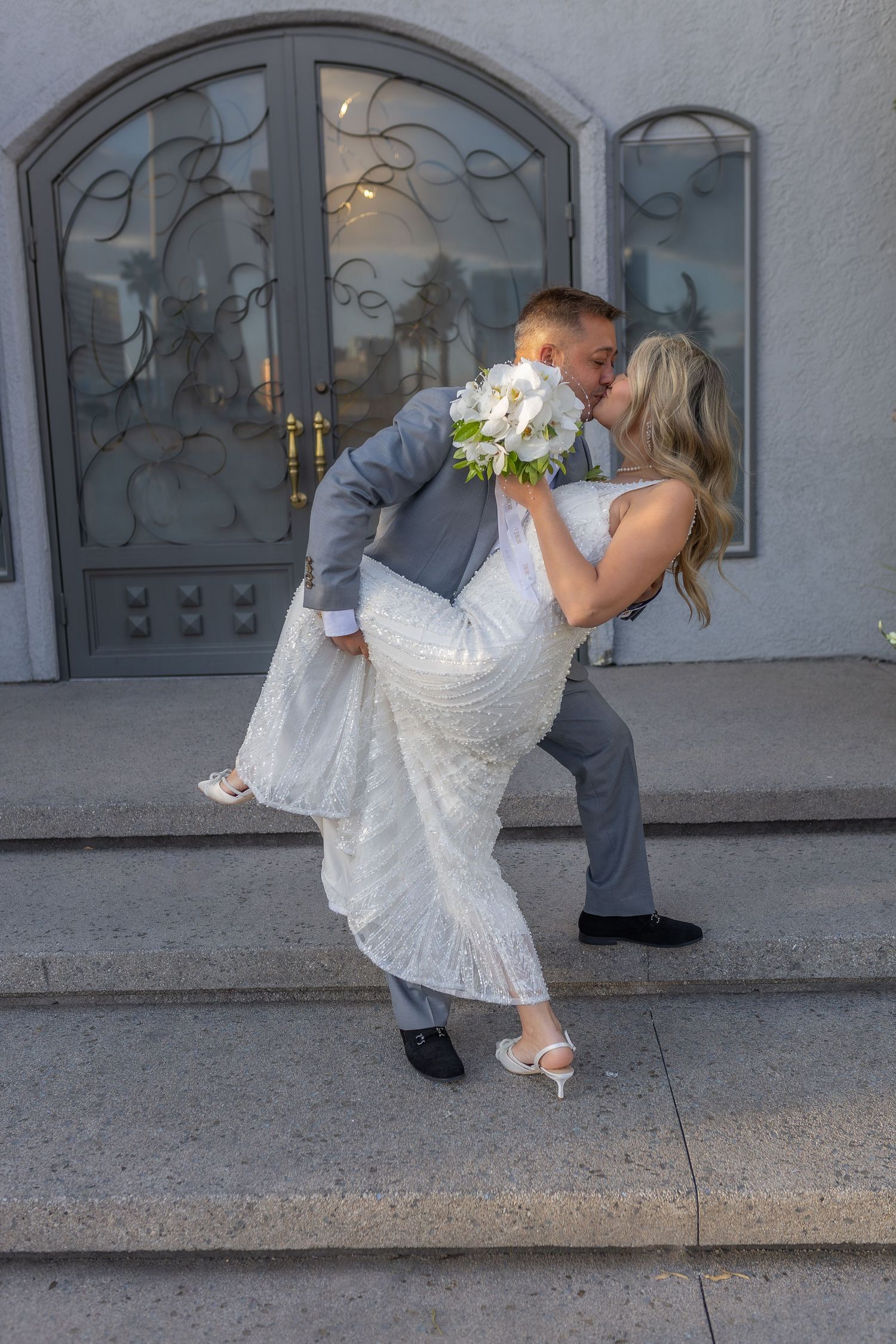 Bride and groom eloping at the Chapel of the Flowers in Las Vegas-Las Vegas wedding and elopement photographer
