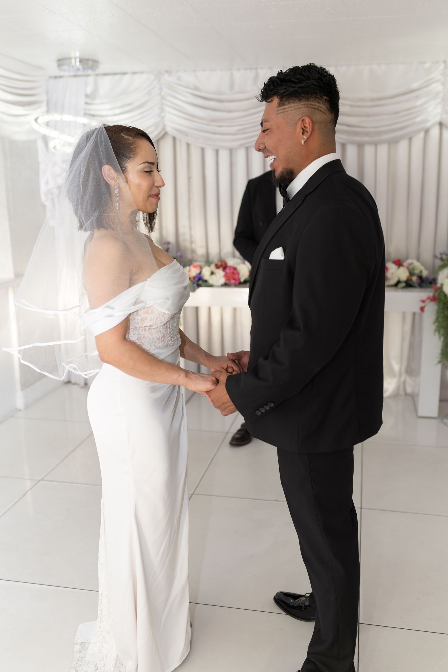 Bride and groom exchanging vows at the Little White chapel in downtown Las Vegas- intimate wedding and elopement photographer
