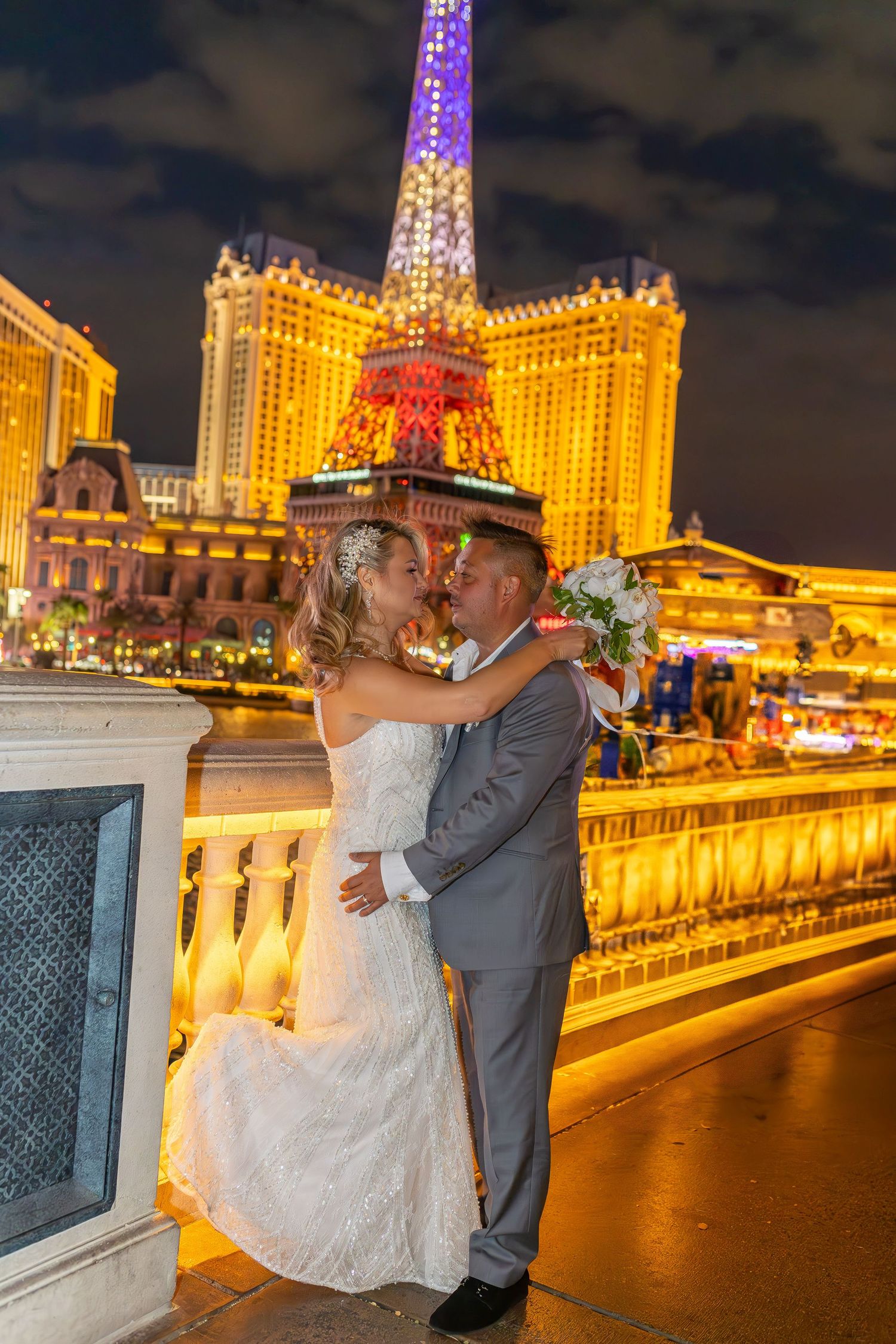 Bride and groom celebrating their elopement at the Las Vegas Bellagio Fountains-Las Vegas photographer
