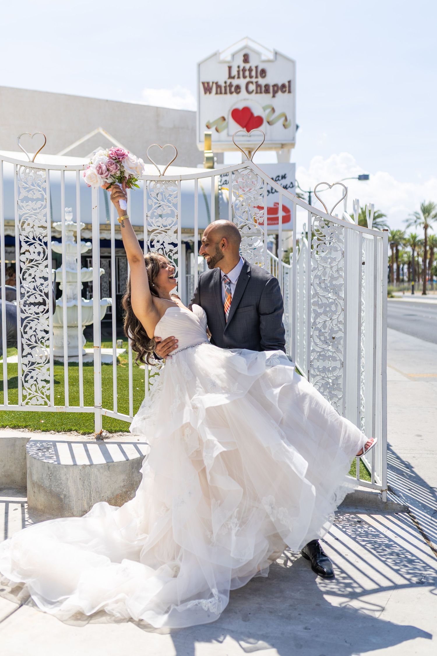 Bride and groom exchanging vows at the Little White chapel in downtown Las Vegas- intimate wedding and elopement photographer