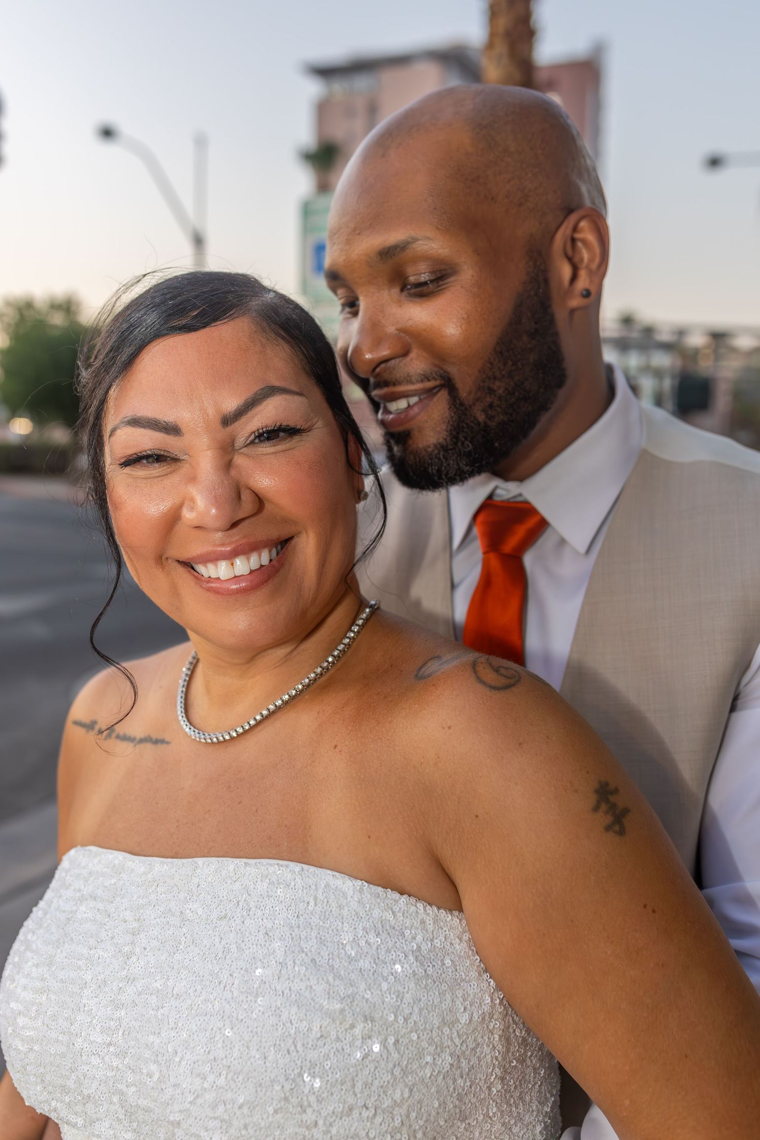 Bride and groom smiling at the Little White chapel in downtown Las Vegas- intimate wedding and elopement photographer