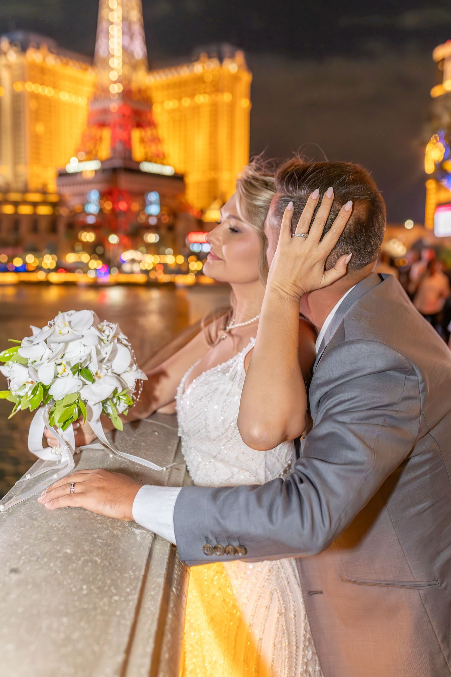Bride and groom celebrating their elopement at the Las Vegas Bellagio Fountains-Las Vegas photographer