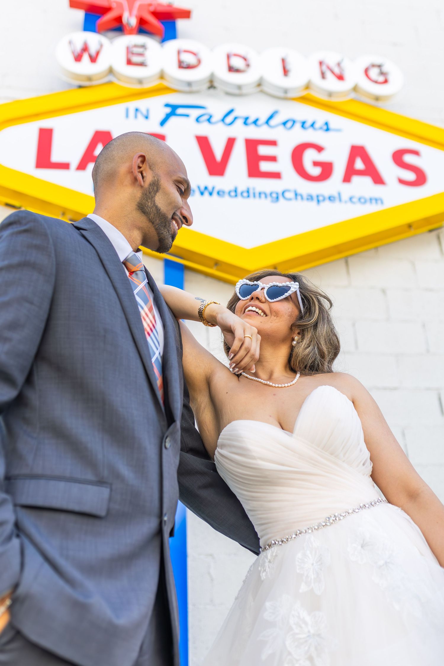 Bride and groom exchanging vows at the Little White chapel in downtown Las Vegas- intimate wedding and elopement photographer