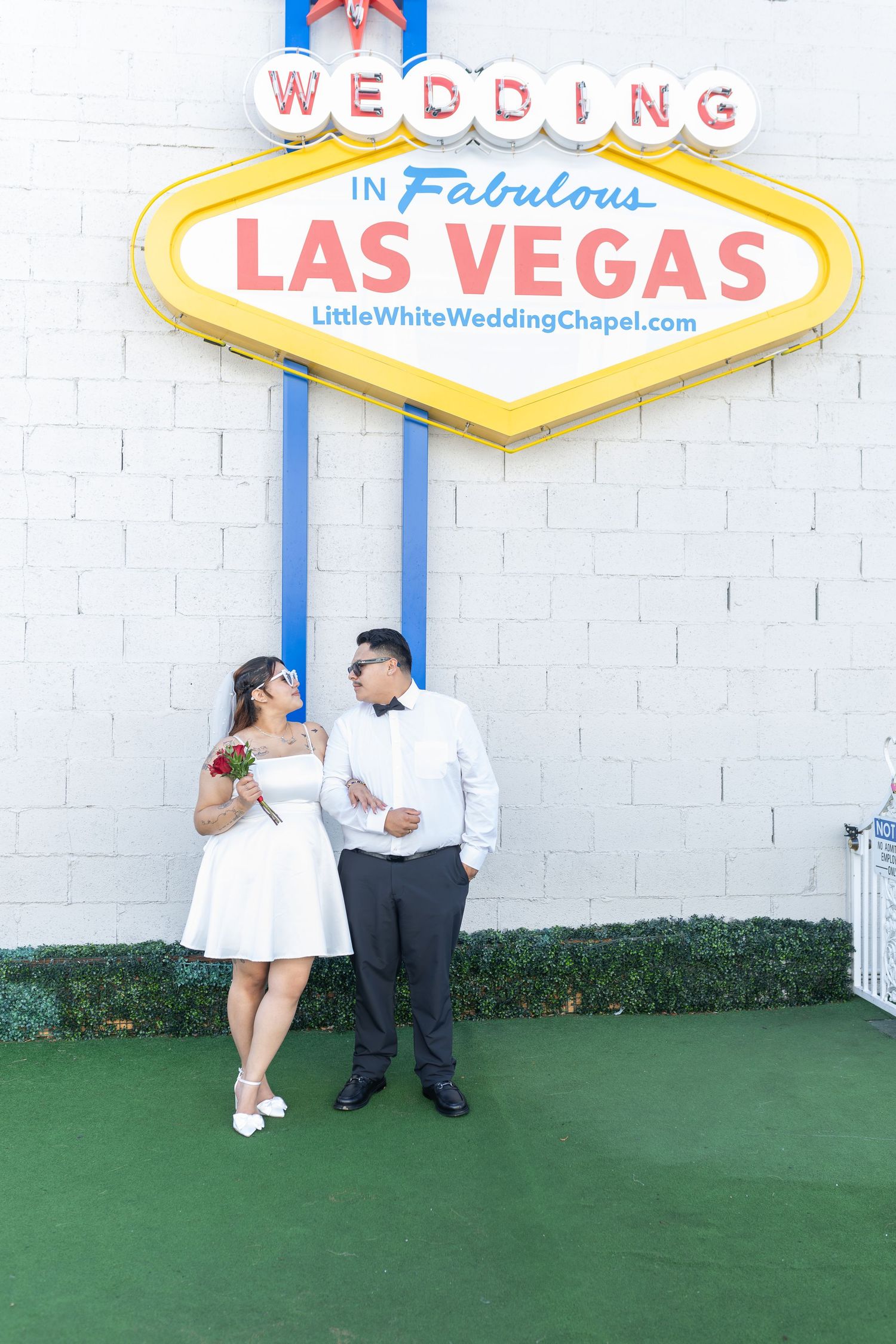 Bride and groom exchanging vows at the Little White chapel in downtown Las Vegas- intimate wedding and elopement photographer